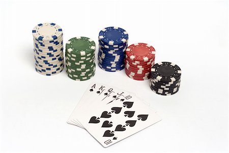 A royal straight flush hand with colored poker chips. Stock Photo - Budget Royalty-Free & Subscription, Code: 400-03990091