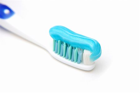 Close up of toothbrush with gel Fotografie stock - Microstock e Abbonamento, Codice: 400-03990211