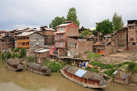 poor people of india and their villages - A small community in Srinagar, Kashmir (India) on a hot muggy summer day. Stock Photo - Budget Royalty-Free & Subscription, Code: 400-03990458
