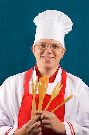 happy chef with wooden fork Stock Photo - Budget Royalty-Free & Subscription, Code: 400-03990630
