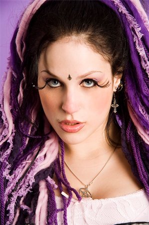 A beautifull girl with purple dreadlocks in her hair Stock Photo - Budget Royalty-Free & Subscription, Code: 400-03990944