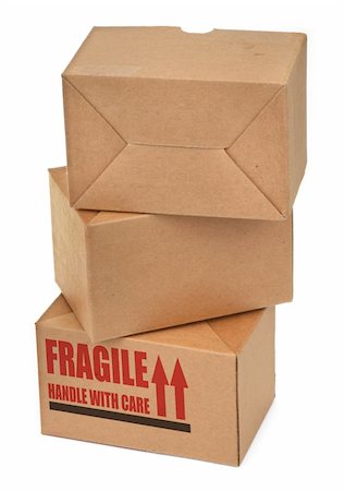 simsearch:700-02637506,k - close-up of three cardboard boxes againt white background, photo does not infringe any copyright Photographie de stock - Aubaine LD & Abonnement, Code: 400-03991007