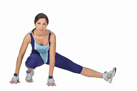 simsearch:400-03994929,k - Fitness girl doing stretching movements during the exercise training. Stockbilder - Microstock & Abonnement, Bildnummer: 400-03991127