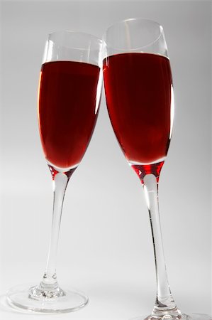 simsearch:400-05286682,k - Two glasses with red wine in contact Stock Photo - Budget Royalty-Free & Subscription, Code: 400-03991278