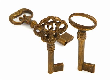 simsearch:400-04023924,k - close-up of three ornamented old keys against white background Stock Photo - Budget Royalty-Free & Subscription, Code: 400-03991302
