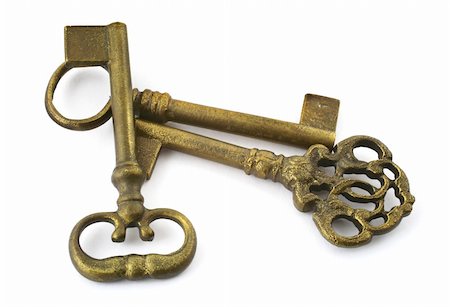 simsearch:633-02645556,k - close-up of three gilded keys against white background Stock Photo - Budget Royalty-Free & Subscription, Code: 400-03991395