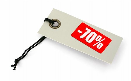 reduced sign in a shop - close-up of a Sale tag against white, a small shadow under it, no copyright infringement Stock Photo - Budget Royalty-Free & Subscription, Code: 400-03991457