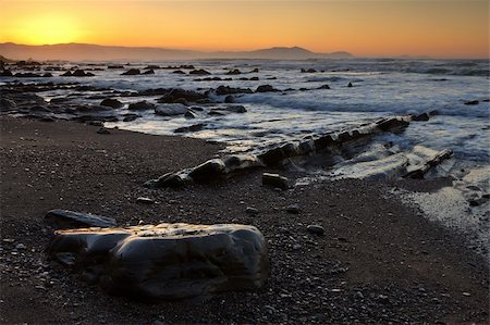 simsearch:400-04315171,k - Beautiful sunrise in the north of spanish coastline Fotografie stock - Microstock e Abbonamento, Codice: 400-03991703