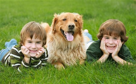 simsearch:400-05875962,k - Two Boys and a Dog With Big Smiles Photographie de stock - Aubaine LD & Abonnement, Code: 400-03991787