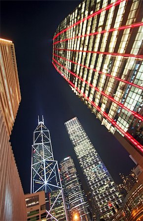 Skyscrapers Night view in Hong Kong central district Fotografie stock - Microstock e Abbonamento, Codice: 400-03991796