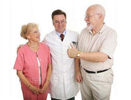 Senior couple giving a thumbs-up to their eye doctor after a successful office visit.  Isolated on white. Stock Photo - Budget Royalty-Free & Subscription, Code: 400-03991977