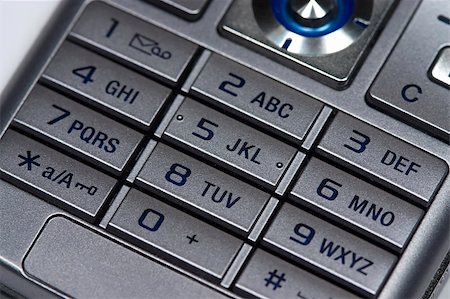 simsearch:400-04511025,k - close up of silver mobile phone keyboard. Stock Photo - Budget Royalty-Free & Subscription, Code: 400-03992821