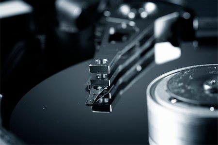 simsearch:400-03992953,k - Macro photo - Hard Disk Drive. Great details ! Stock Photo - Budget Royalty-Free & Subscription, Code: 400-03992955