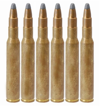 simsearch:400-05706425,k - A row of rifle bullets on white background Fotografie stock - Microstock e Abbonamento, Codice: 400-03993171