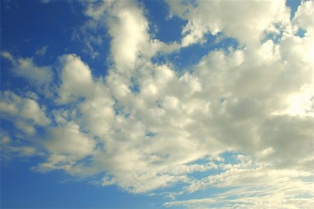 simsearch:400-03944472,k - White beautiful clouds in the sunny sky. Stock Photo - Budget Royalty-Free & Subscription, Code: 400-03993944