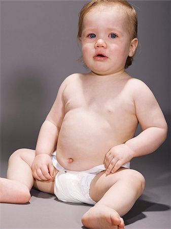 diaper girl - Portrait of Baby Girl Stock Photo - Premium Royalty-Free, Code: 600-04424894
