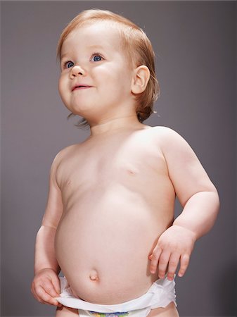 stomach (upper abdomen) - Portrait of Baby Girl Stock Photo - Premium Royalty-Free, Code: 600-04424893