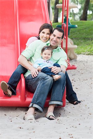 father and baby girl in park - Family on Slide Stock Photo - Premium Royalty-Free, Code: 600-04625283