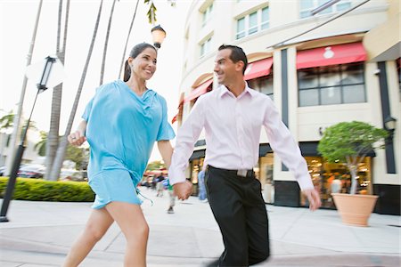 Couple Walking Outdoors Stock Photo - Premium Royalty-Free, Code: 600-04625300