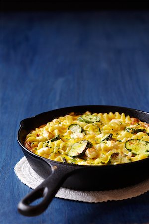 pasta nobody - Rigatoni with Zucchini in Cast Iron Pan Stock Photo - Premium Royalty-Free, Code: 600-04625564
