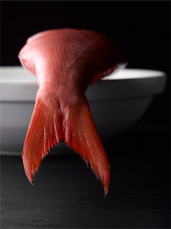 red fish - Fish in Bowl Stock Photo - Premium Royalty-Free, Code: 600-04625589