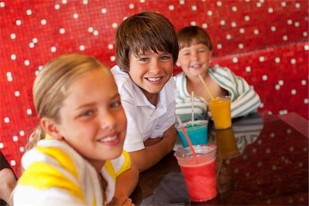 drinking milk shake - Children at Pool Bar Stock Photo - Premium Royalty-Free, Code: 600-05524090