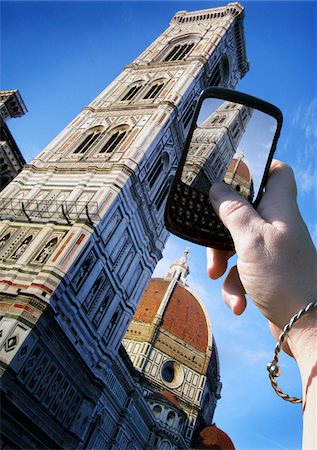 Woman's Hand Taking Photo of Basilica di Santa Maria del Fiore, Florence, Italy Stock Photo - Premium Royalty-Free, Code: 600-05560148