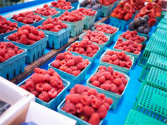 Cartons of Raspberries at Market Stock Photo - Premium Royalty-Free, Artist: Michael Alberstat, Image code: 600-05560311