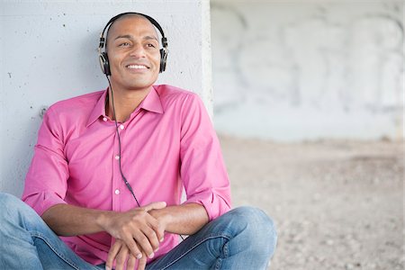 Portrait of Man using Headphones Stock Photo - Premium Royalty-Free, Code: 600-05609739