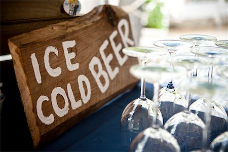 simsearch:600-05948262,k - Ice Cold Beer Sign and Drinking Glasses, Muskoka, Ontario, Canada Stock Photo - Premium Royalty-Free, Code: 600-05641649