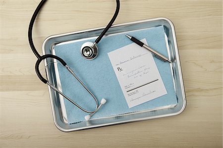 pen and prescription - Stethoscope, Pen and Prescription on Medical Tray, Birmingham, Alabama, USA Stock Photo - Premium Royalty-Free, Code: 600-05803303