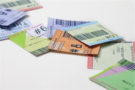 simsearch:600-05803380,k - Movie Ticket Stubs Stock Photo - Premium Royalty-Free, Code: 600-05803393