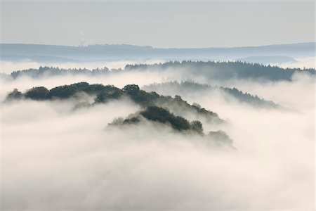 foggy (weather) - Fog, Forest and Hill, View From Cloef, Mettlach, Merzig-Wadern, Saarland, Germany Stock Photo - Premium Royalty-Free, Code: 600-05821952