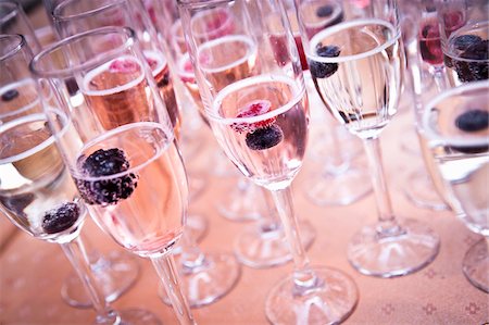 festivity (ceremonious and special festive occasion) - Close-up of Champagne Glasses filled with Sparkling Wine Stock Photo - Premium Royalty-Free, Code: 600-05822166
