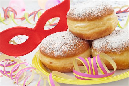 simsearch:600-05854178,k - Doughnuts on Paper Plate, Mask and Streamers Stock Photo - Premium Royalty-Free, Code: 600-05854199