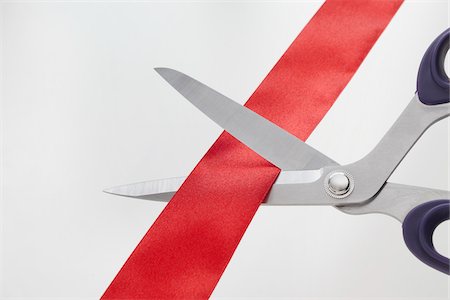 Scissors Cutting Red Ribbon Foto de stock - Sin royalties Premium, Código: 600-05947695