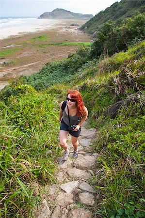 Woman Hiking up Coastal Hills, Ilha do Mel, Parana, Brazil Foto de stock - Sin royalties Premium, Código: 600-05947909