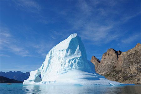 Iceberg and Mountains, Bjorn Oer, Ittoqqortoormiit, Sermersooq, Greenland Stock Photo - Premium Royalty-Free, Code: 600-06009040