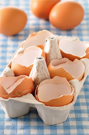 Broken Egg Shells in Carton Stock Photo - Premium Royalty-Free, Code: 600-06025220