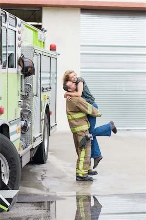 Firefighter and Girlfriend, Florida, USA Foto de stock - Royalty Free Premium, Número: 600-06038159