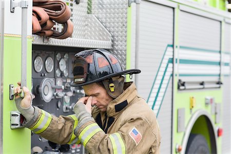 firemen uniform - Firefighter, Florida, USA Stock Photo - Premium Royalty-Free, Code: 600-06038160