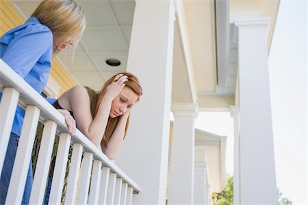 scoraggiato - Mother and Daughter on Porch, Florida, USA Fotografie stock - Premium Royalty-Free, Codice: 600-06038174