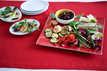 Antipasto with Grilled Vegetables, Shrimp, and Olives Stock Photo - Premium Royalty-Free, Code: 600-06038240
