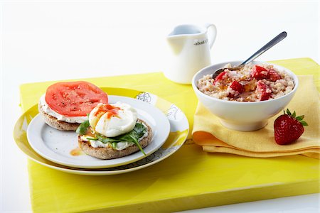 simsearch:600-05947693,k - Hot Cereal with Strawberry and Poached Egg on English Muffin Stock Photo - Premium Royalty-Free, Code: 600-06038255