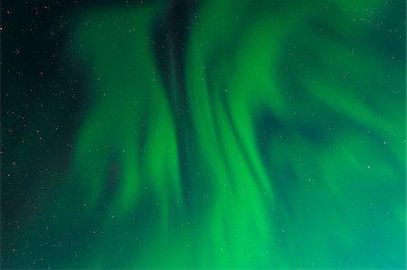 extraño - Northern Lights near Tromso, Troms, Norway Foto de stock - Sin royalties Premium, Código: 600-06038337
