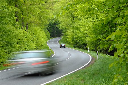 speed car - Road Through Forest, Spessart, Bavaria, Germany, Europe Stock Photo - Premium Royalty-Free, Code: 600-06144896