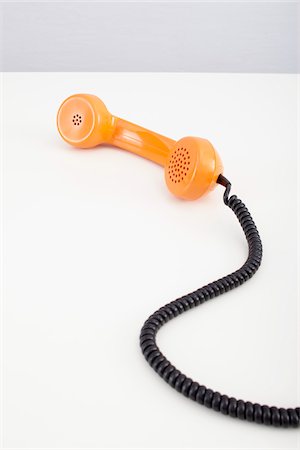 Récepteur téléphonique orange Photographie de stock - Premium Libres de Droits, Code: 600-06302225