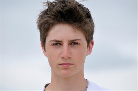 Close-up Portrait of Teenage Boy, Ile de Re, France Foto de stock - Sin royalties Premium, Código: 600-06334388