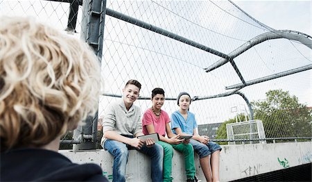 Three Boys and One Girl in Playground, Mannheim, Baden-Wurttemberg, Germany Stock Photo - Premium Royalty-Free, Code: 600-06382851