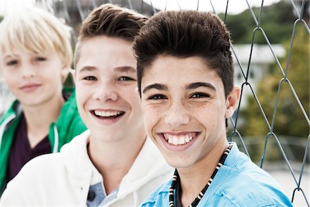 Portrait of Boys Hanging Out in Playground, Mannheim, Baden-Wurttemberg, Germany Stock Photo - Premium Royalty-Free, Code: 600-06382882